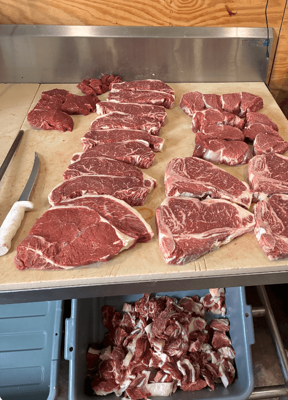 Steaks, roasts, and everyday cuts from one fullblood animal on the butcher table